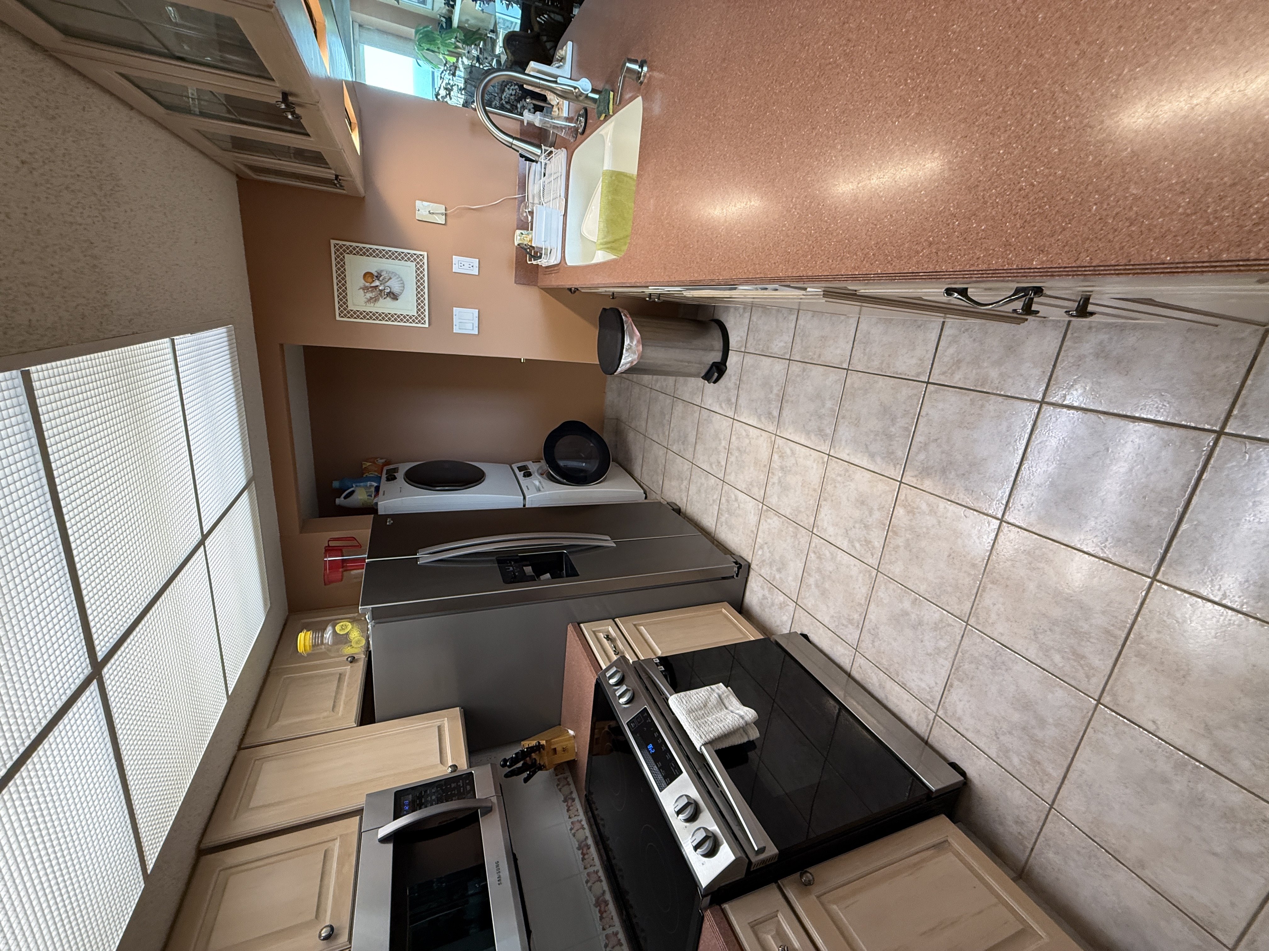 Kitchen with new stainless appliances